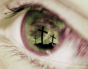 crosses reflected in an eye